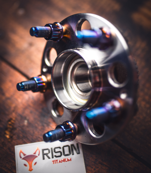Running Wheel Spacers? Why Stock Studs Are a Ticking Time Bomb (and How TC11 Titanium Saves Your Track Day)